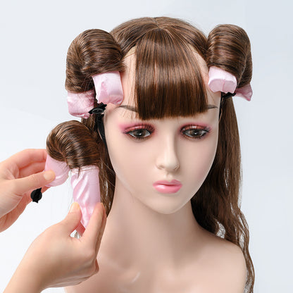 Glowglo lazy hair curler pink soft foam rollers wrapped in brown hair on mannequin head